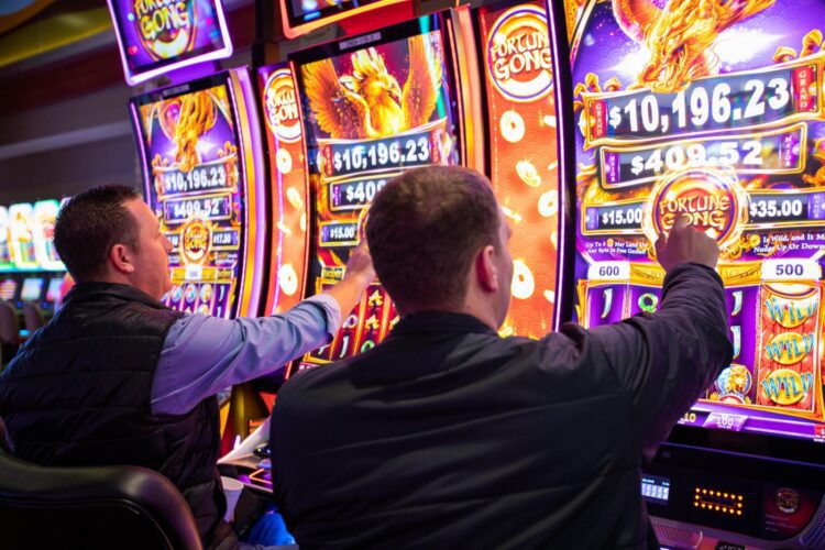 2 Guys Playing Slots 750x500 1 - Skill Games At Casinos